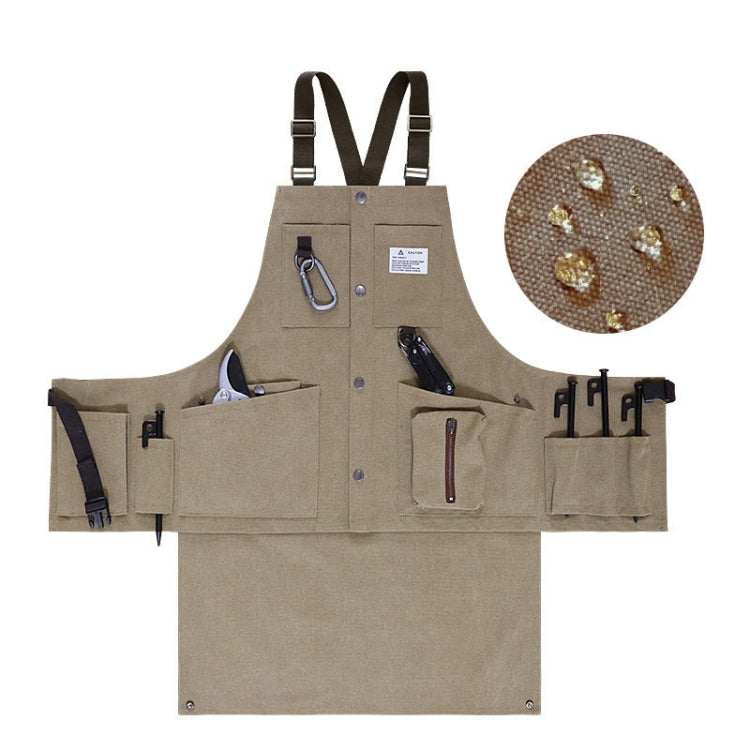 Khaki canvas tool apron with tool pockets, center organizer sleeve, and adjustable straps