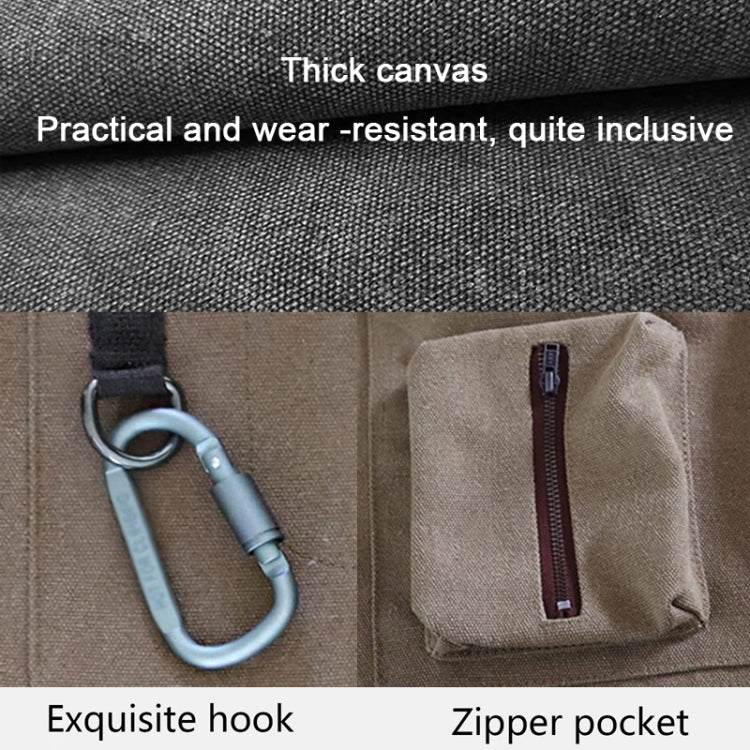 Tan canvas tool apron with metal D-ring, hook detail, and zip front pocket