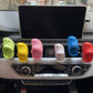 Set of shoe-shaped car air vent ornaments in green, yellow, pink, blue, and red