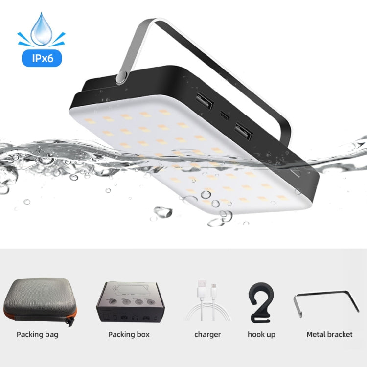 Waterproof portable LED camping light with USB ports on side and illuminated white panel