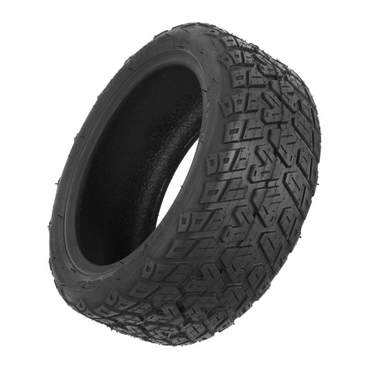 Black scooter tire side view showing thick tread and raised block pattern