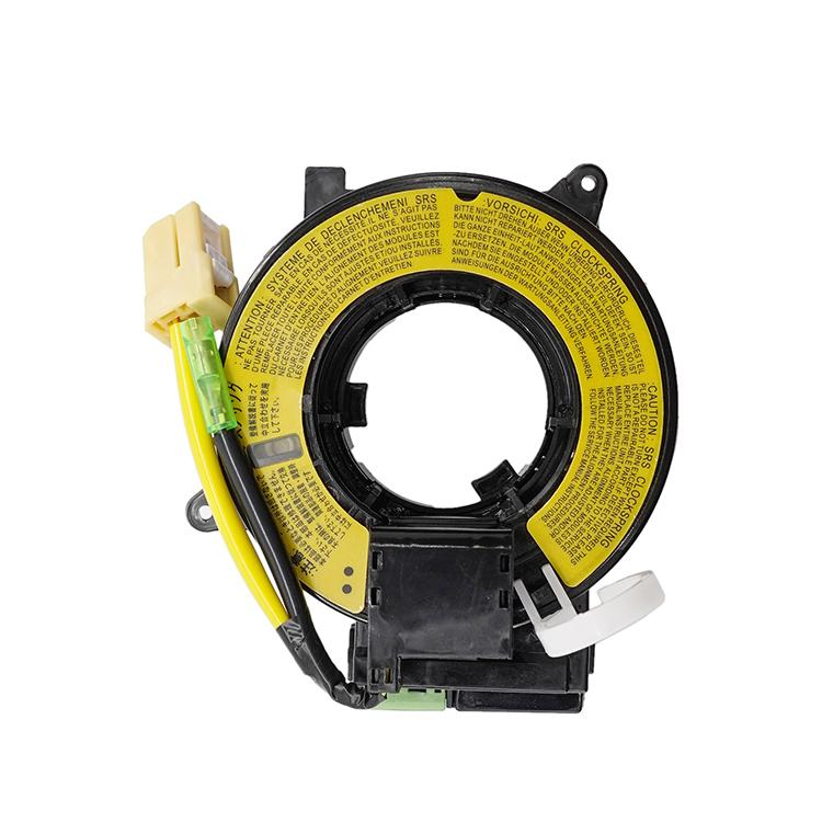 Clock spring coil assembly with yellow label ring and black connector housing