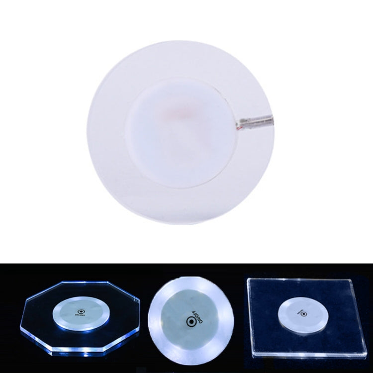 Octagonal transparent LED acrylic coaster with white light, slim crystal base and on/off switch.