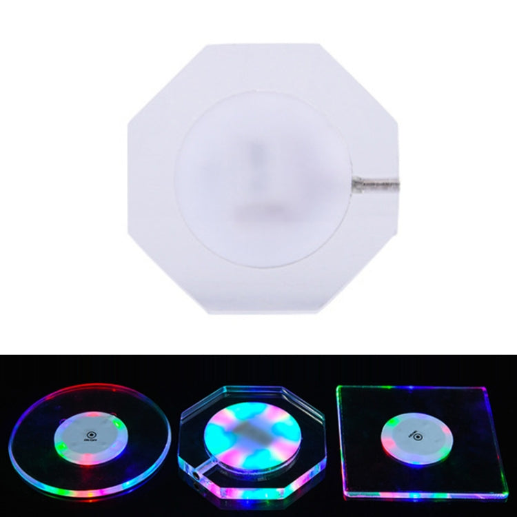 Octagonal transparent LED acrylic coaster with white light, visible on/off switch and slim base.