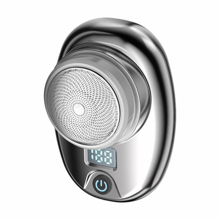 Silver and dark portable electric mini shaver with round foil head, power button, and LCD