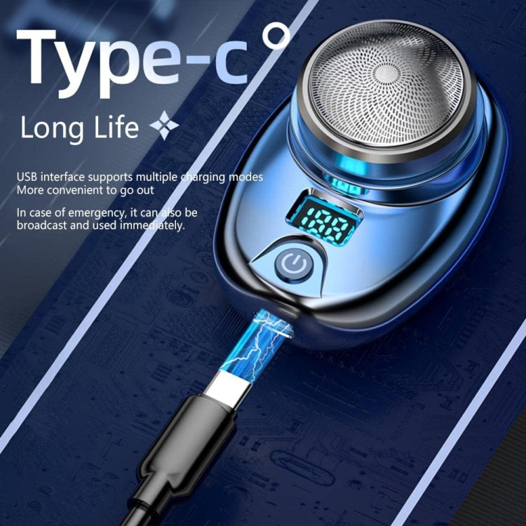 Blue mini electric shaver with circular foil head and USB Type-C charging cable