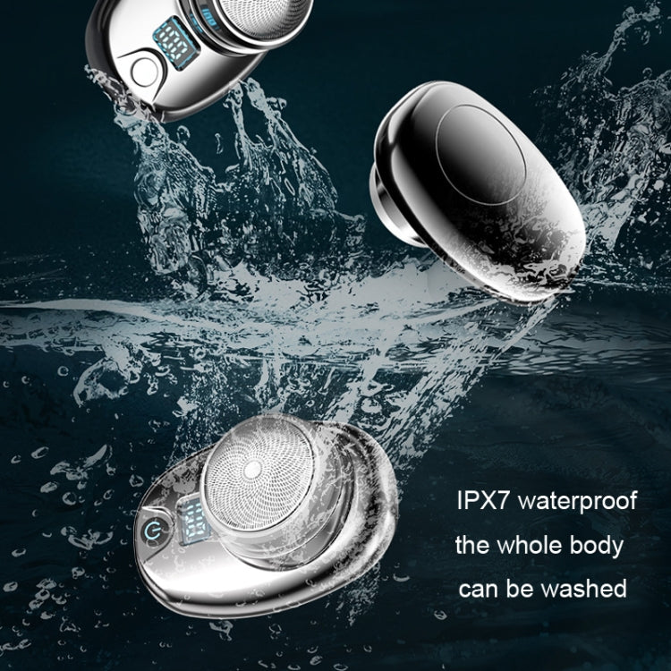 Black mini electric shaver with round foil head and LCD panel near water splash
