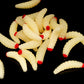 Yellow plastic worm grubs with red-tipped beads, fake fishing bait