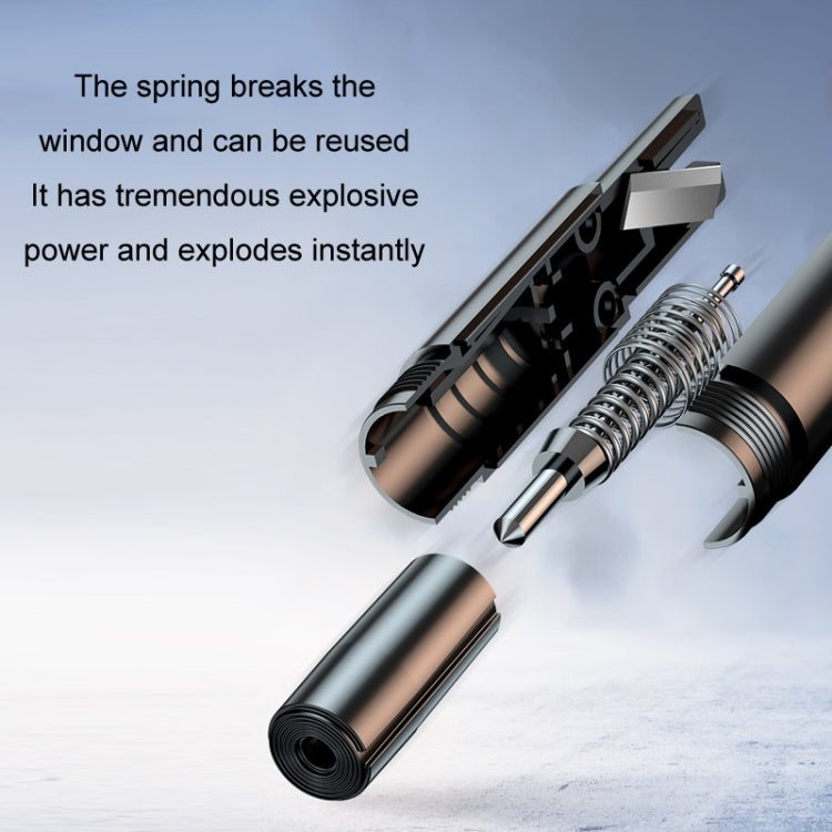 Disassembled silver window escape hammer showing spring mechanism and tip
