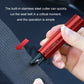 Red vehicle escape safety hammer with black base, shown breaking a seatbelt