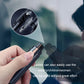 Black and silver emergency escape hammer held by hand near vehicle window