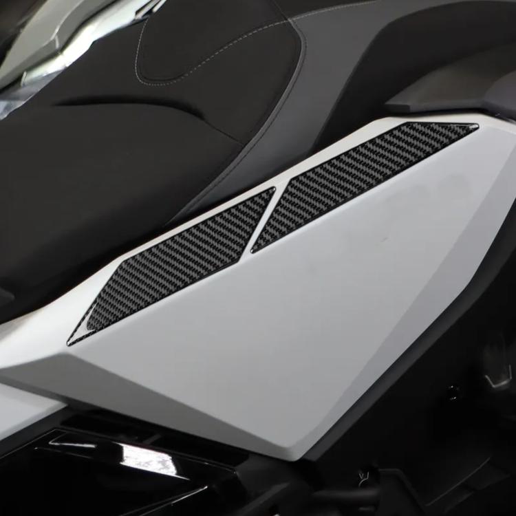Rear side panel upper protectors installed; black carbon-fiber style panel pieces