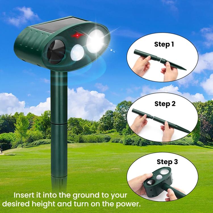 Green solar ultrasonic repellent stake with three-step setup showing ground insertion