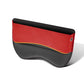 Red and black car seat gap storage box with orange trim and stitched edges