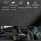 Close-up of gray-textured car seat gap storage box material and stitching