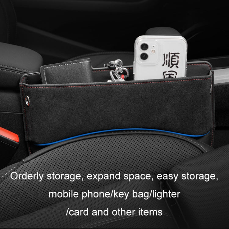 Black car seat gap storage box with blue trim holding phone and small items