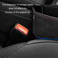Black car seat gap organizer pocket with blue trim and red stitching detail