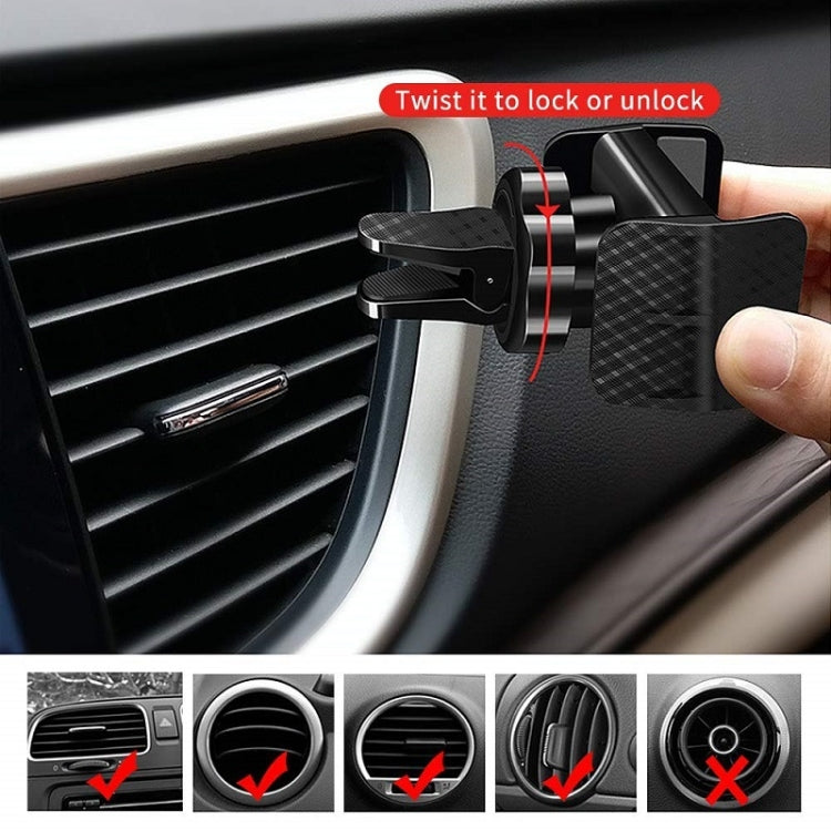 Black phone holder mounted to car air vent with rotating arm and locking twist
