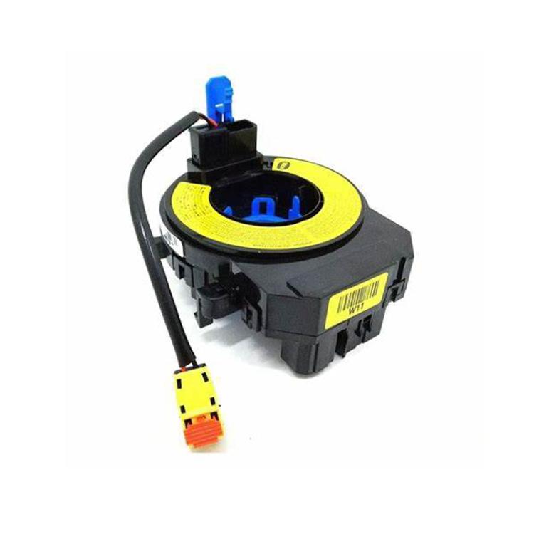 Clock spring coil for steering wheel, black unit with yellow reel and electrical plug