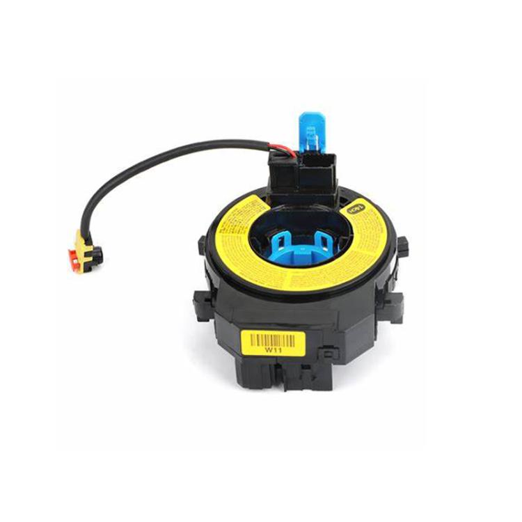 Steering clock spring coil with blue connector and flat ribbon cable, yellow center reel