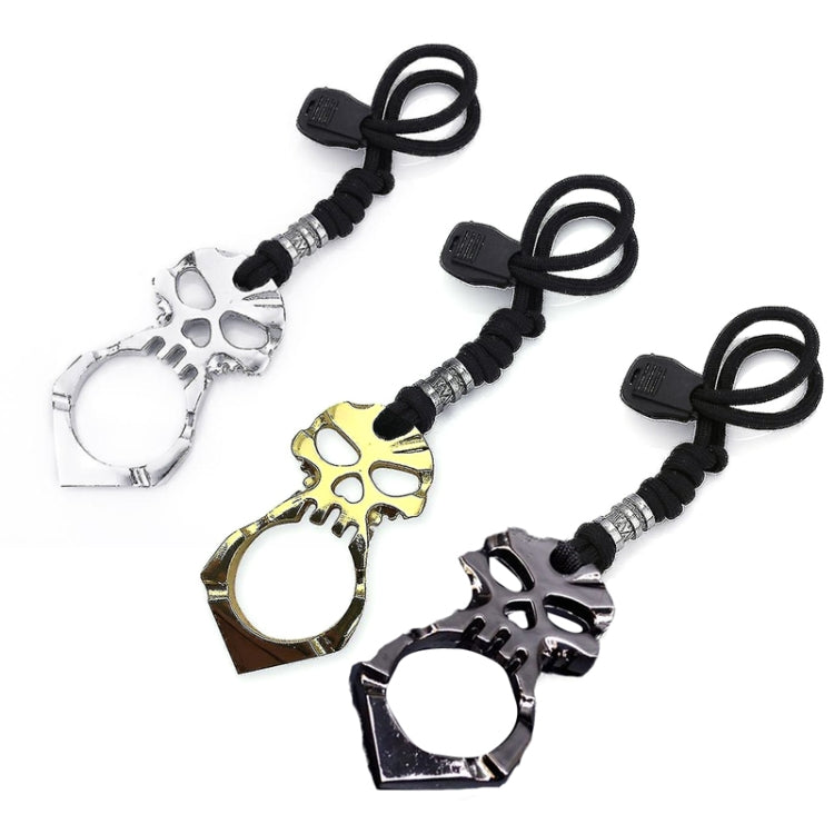 Assorted skull self-defense keychains with black rope cords and metal rings