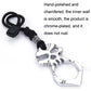 Silver skull self-defense keychain with black cord and chrome-finish ring