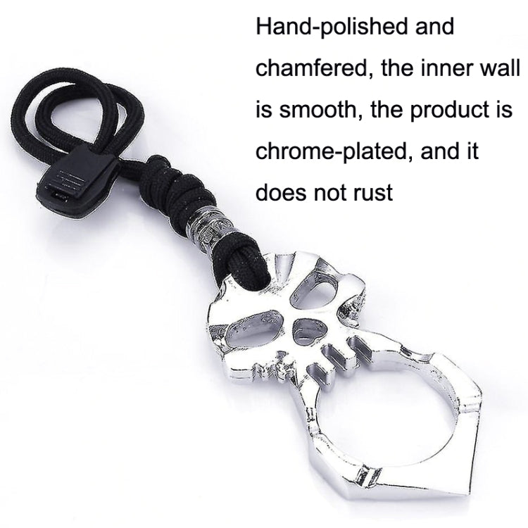 Silver skull self-defense keychain with black cord and chrome-finish ring