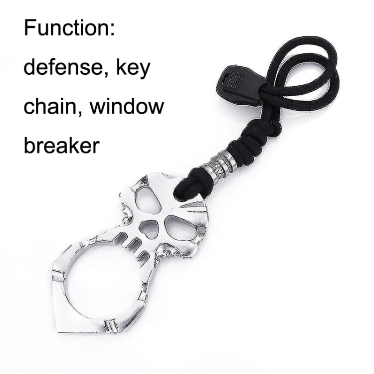 Silver skull self-defense keychain with black cord and chrome metal ring