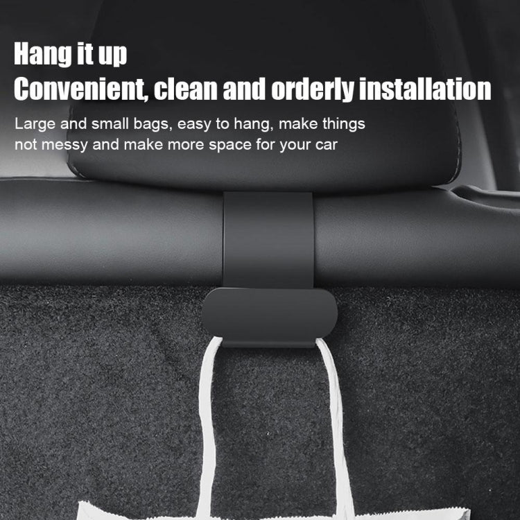 Trunk seat hook with white rope loop hanging from the dark gray U-shaped hanger