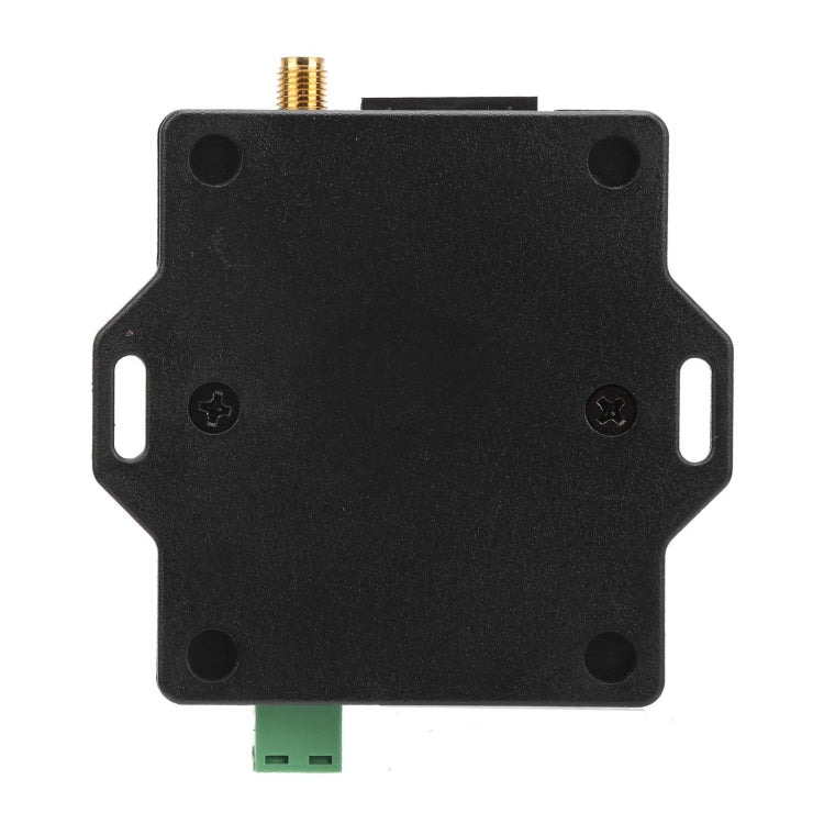 Black enclosure of a GSM alarm module with mounting holes and green screw terminal
