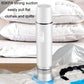 White handheld vacuum sealer pulling vacuum on bags for quilts and clothes