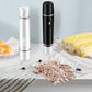White and black handheld vacuum sealers with vacuum-sealed food pouches