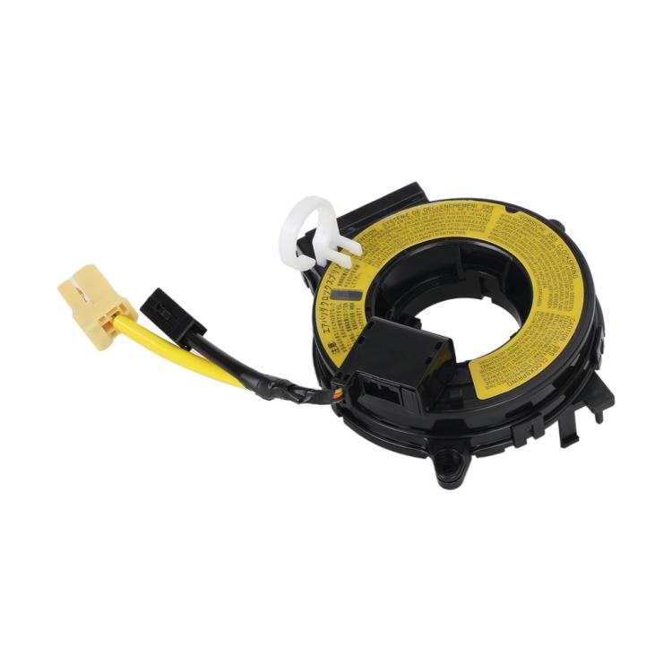 Clock spring coil assembly, yellow label ring with attached black wiring and white clips