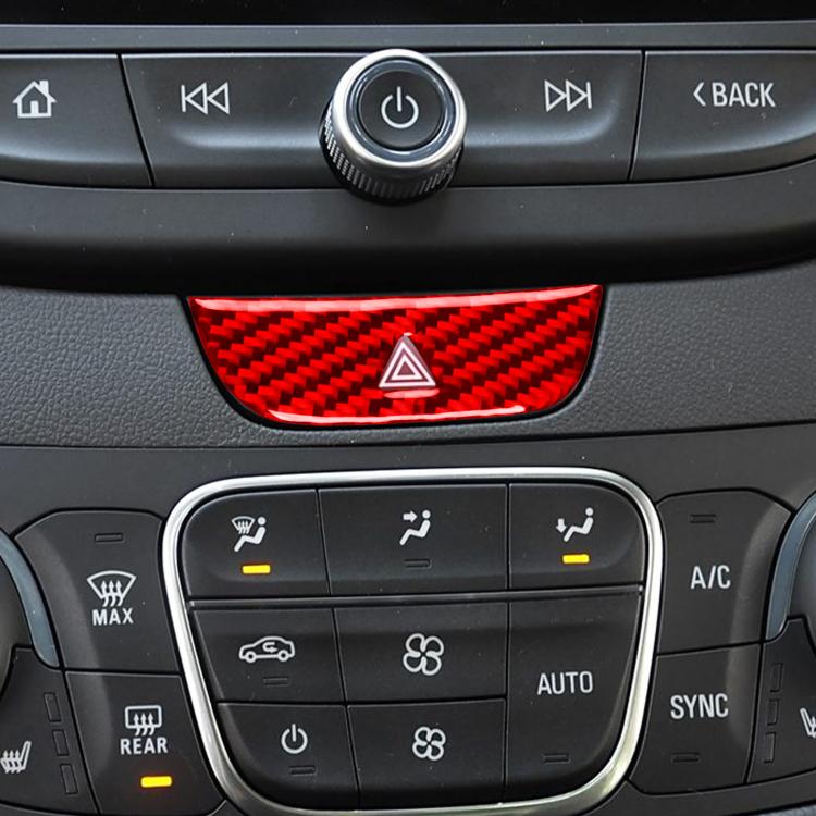 Red carbon-fiber hazard light sticker on dashboard with centered triangle icon