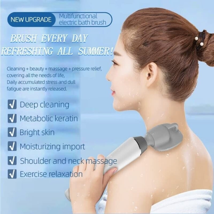 Electric bath brush being used on neck and shoulder with silicone vibration head