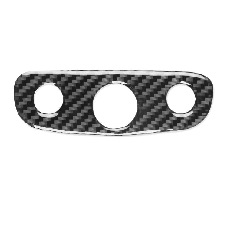 Black carbon-fiber headlight switch sticker with three round cutouts