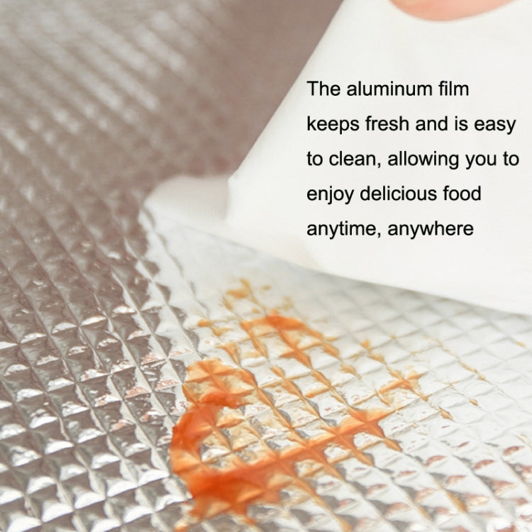 Insulated lunch bag lining with quilted silver film and orange panel