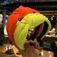 Pressed fabric headbands, orange and neon yellow-green with knotted wide bands