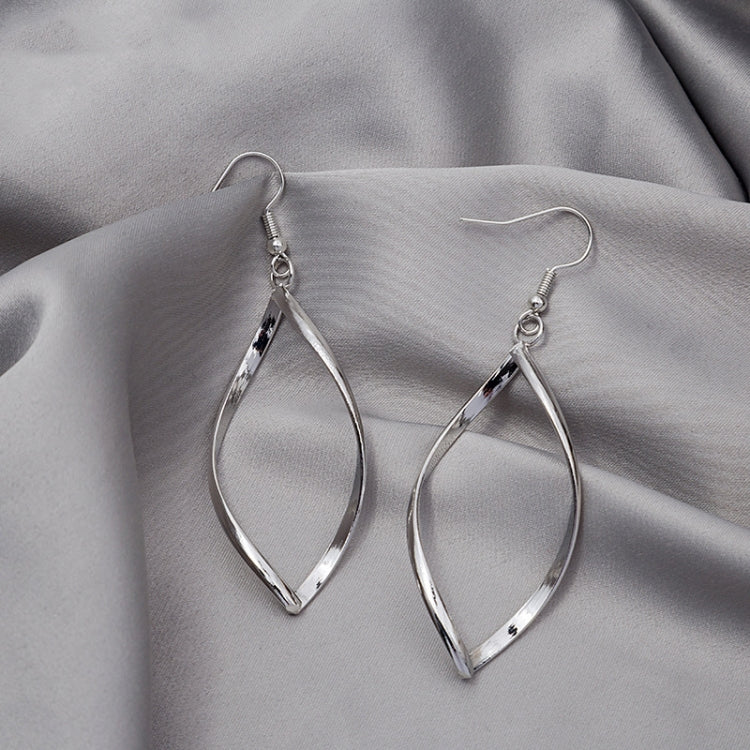 Silver twisted hoop earrings with faceted teardrop shape and hook backs