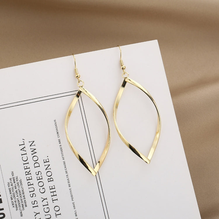 Gold twisted hoop earrings with angled faceted panels and hook backs