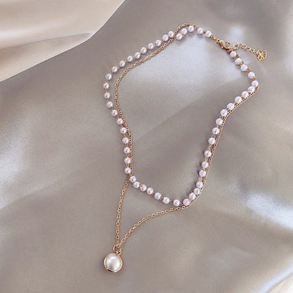 Gold double-layer pearl bead necklace with teardrop pearl pendant