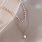 Gold double-layer pearl bead necklace with teardrop pearl pendant