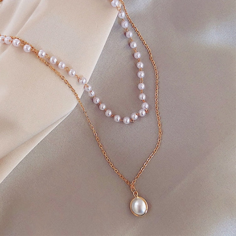 Gold double-layer pearl bead necklace with teardrop pearl pendant