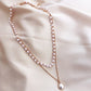 Gold double-layer pearl bead necklace with teardrop pearl pendant, layered strands