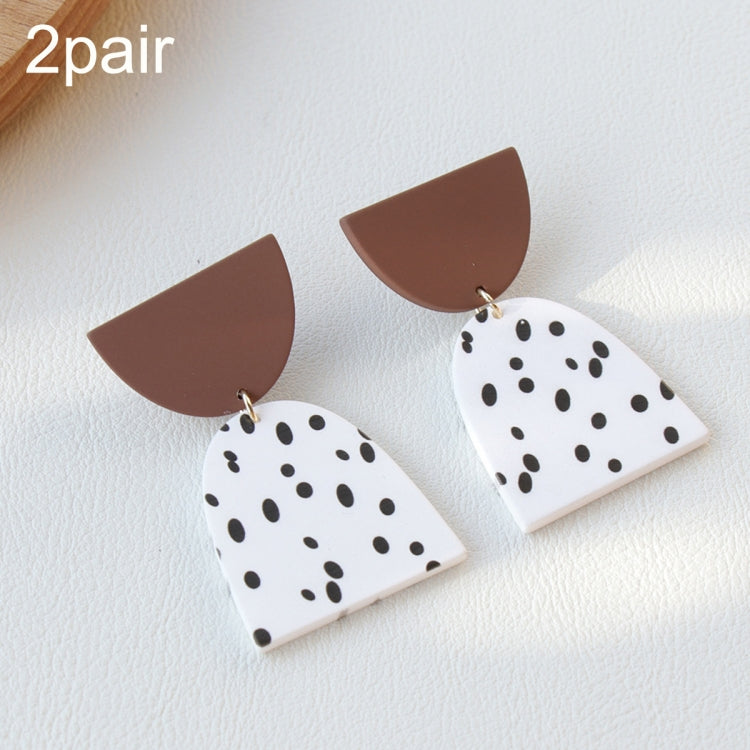 Acrylic clay dangle earrings, two pairs: white with black dots and brown caps