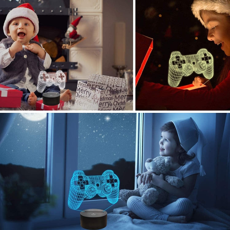 Blue glowing game controller LED lamp near a sleeping child on bed