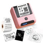 Pink handheld thermal label printer with display, label roll, and sample prints