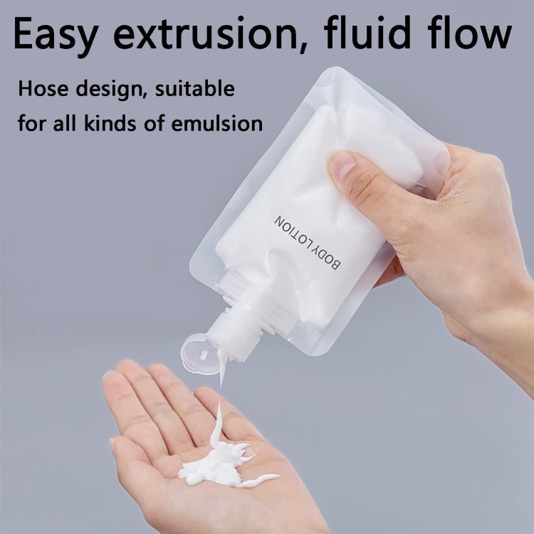 Clear refillable squeeze pouch with hose-style nozzle, squeezed by hand
