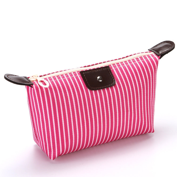 Pink/red striped folding cosmetic bag with zipper and brown leather-look patch