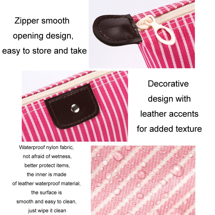 Red striped cosmetic bag close-up with smooth zipper and leather-look accent patch